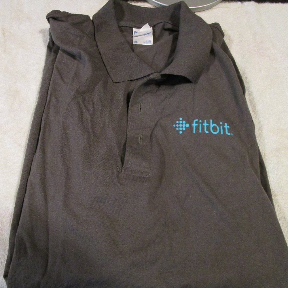 Mens 3 button shirt (set of 2)    Fitbit written on it